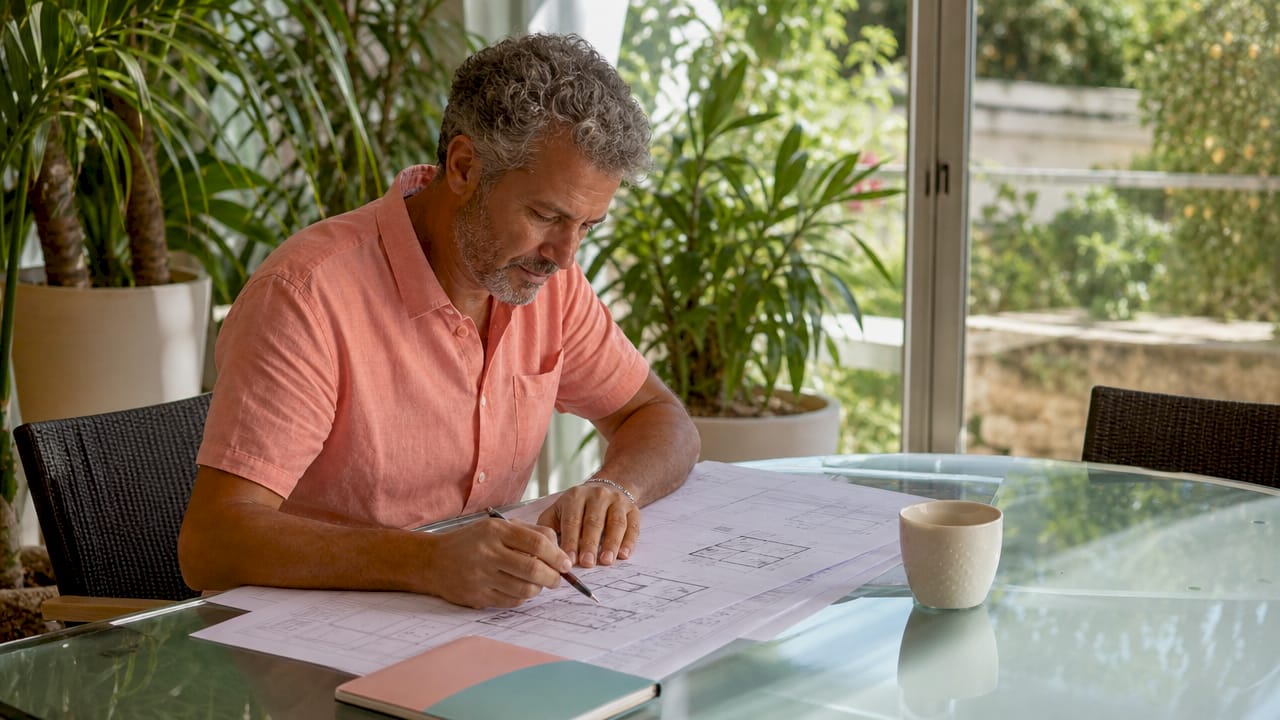 Investor reviewing turnkey property contract