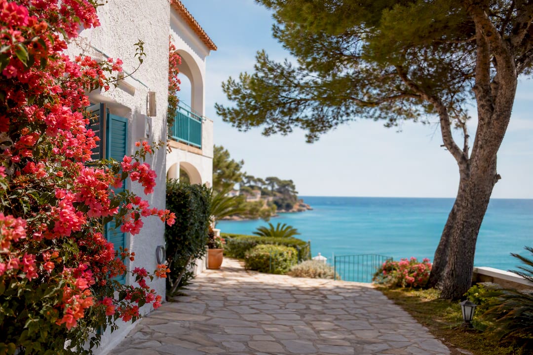 Mediterranean coastal home with beach view